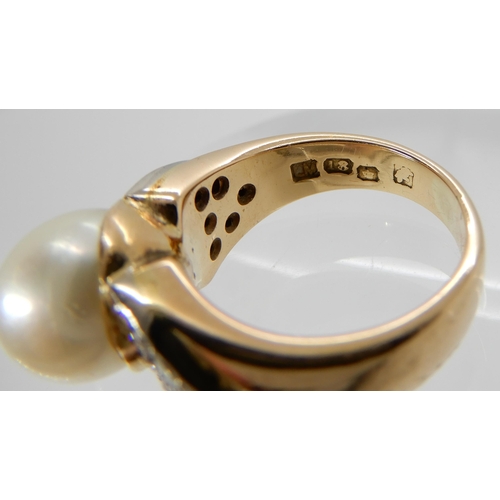 703 - AN 18CT GOLD PEARL AND DIAMOND RING