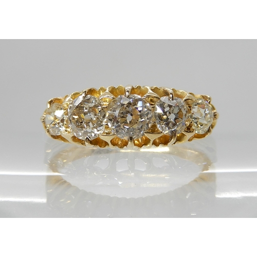 705 - A BRIGHT YELLOW METAL FIVE STONE OLD CUT DIAMOND RING