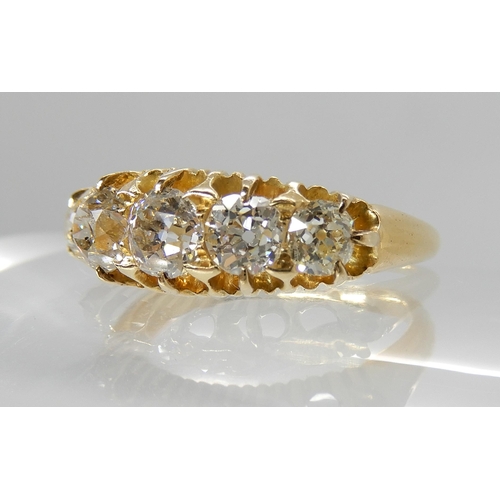 705 - A BRIGHT YELLOW METAL FIVE STONE OLD CUT DIAMOND RING