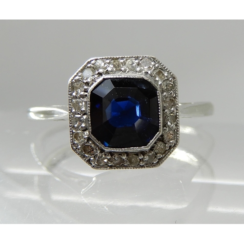 706 - AN 18CT AND PLATINUM DIAMOND AND SAPPHIRE VINTAGE RING