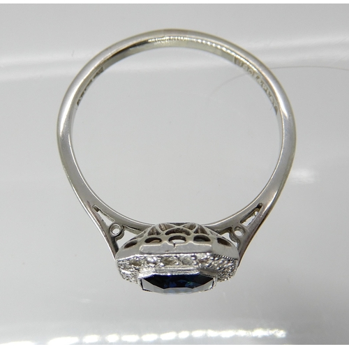 706 - AN 18CT AND PLATINUM DIAMOND AND SAPPHIRE VINTAGE RING