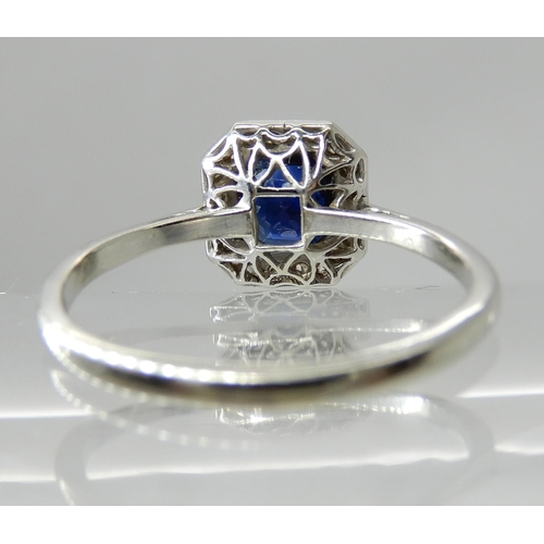 706 - AN 18CT AND PLATINUM DIAMOND AND SAPPHIRE VINTAGE RING