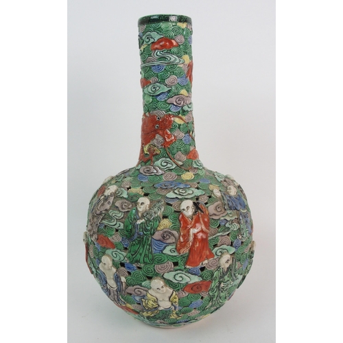 71 - A Cantonese reticulated and moulded baluster vase