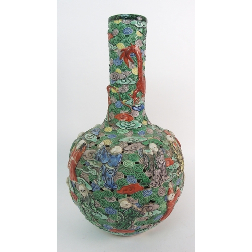 71 - A Cantonese reticulated and moulded baluster vase