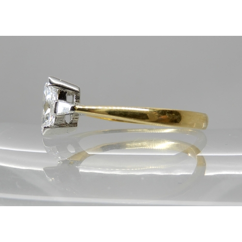 712 - AN 18CT GOLD MARQUIS DIAMOND RING