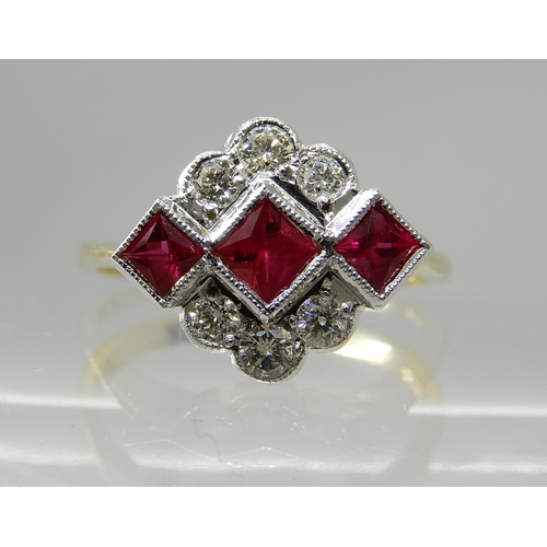 713 - AN 18CT GOLD DIAMOND AND RUBY VINTAGE CLUSTER RING