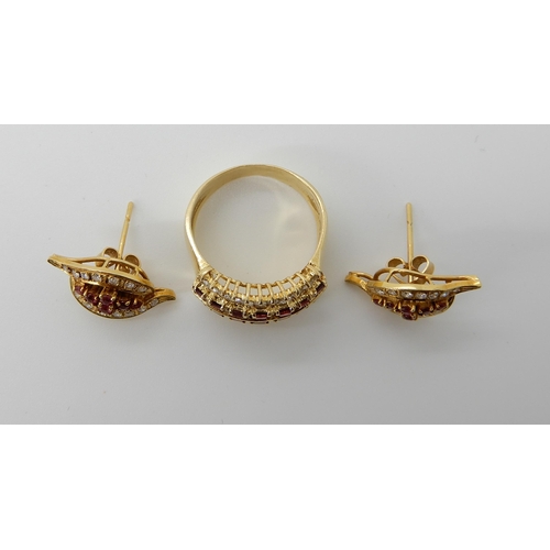 714 - AN 18CT GOLD RUBY AND DIAMOND RING AND EARRINGS