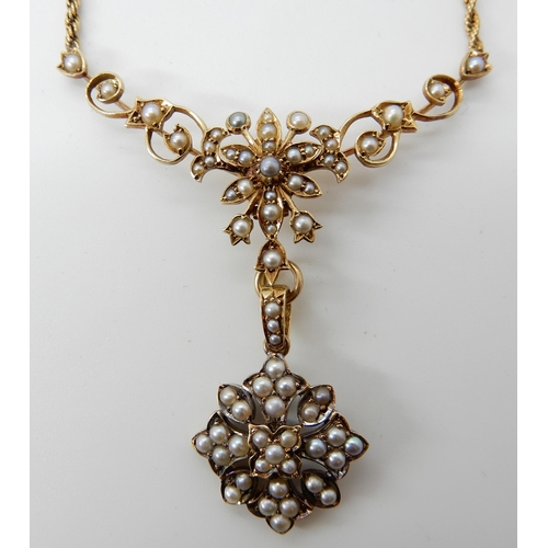 724 - A 15CT GOLD PEARL PENDANT NECKLACE