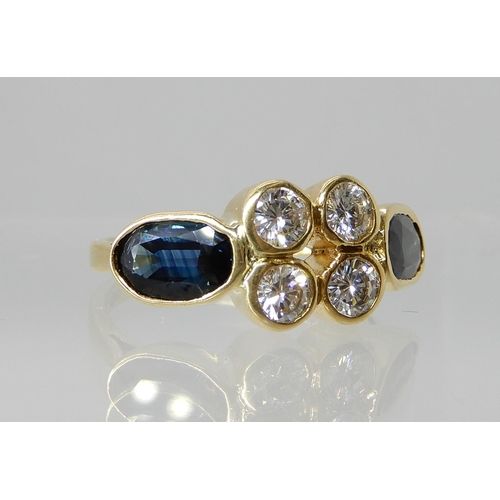 729 - AN 18CT GOLD DIAMOND AND SAPPHIRE RING