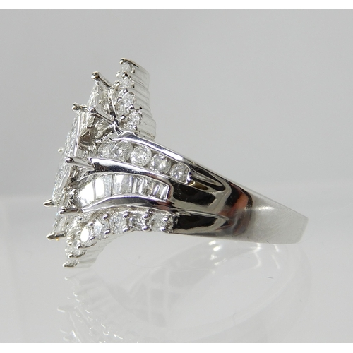 730 - A 9CT WHITE GOLD DIAMOND CLUSTER DRESS RING