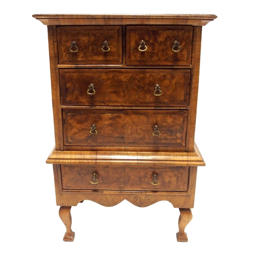 809 - A WILLIAM AND MARY STYLE WALNUT MINIATURE CHEST ON STAND