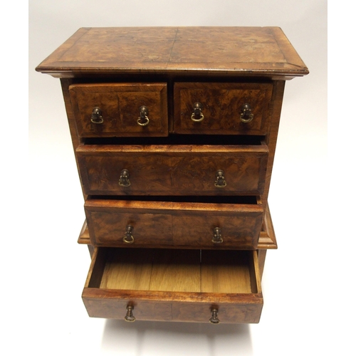 809 - A WILLIAM AND MARY STYLE WALNUT MINIATURE CHEST ON STAND