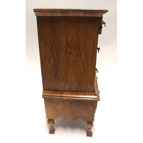 809 - A WILLIAM AND MARY STYLE WALNUT MINIATURE CHEST ON STAND