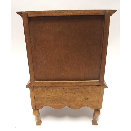 809 - A WILLIAM AND MARY STYLE WALNUT MINIATURE CHEST ON STAND