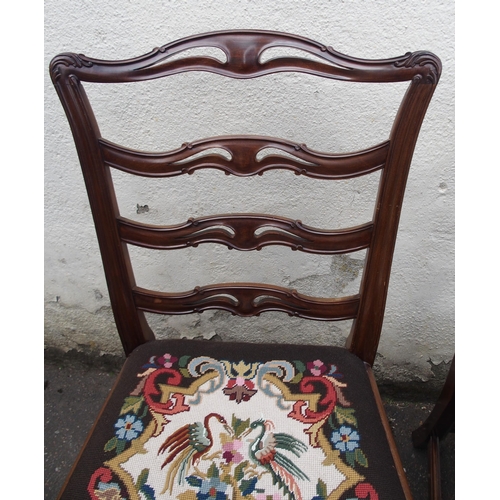 812 - A SET OF EIGHT CHIPPENDALE STYLE REPRODUCTION MAHOGANY DINING CHAIRS