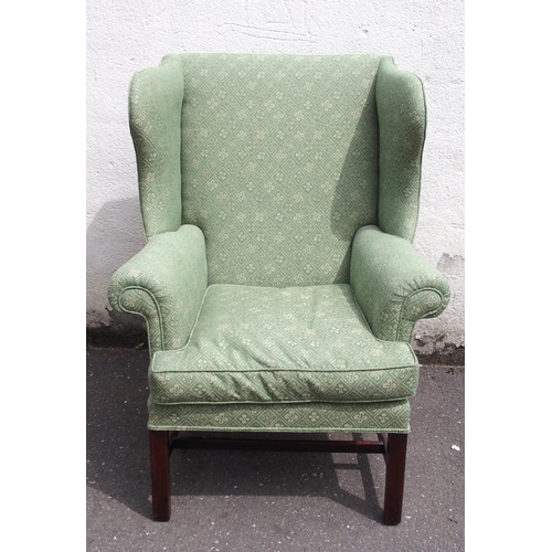 814 - A GEORGIAN STYLE WING BACK ARMCHAIR