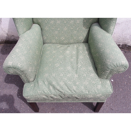 814 - A GEORGIAN STYLE WING BACK ARMCHAIR