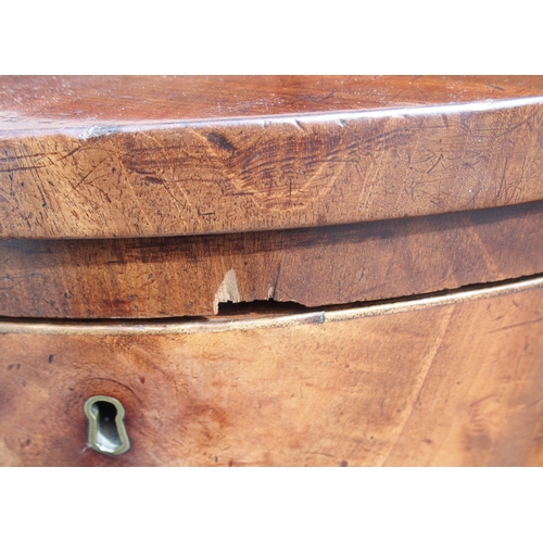 819 - A GEORGIAN MAHOGANY SERPENTINE SIDEBOARD