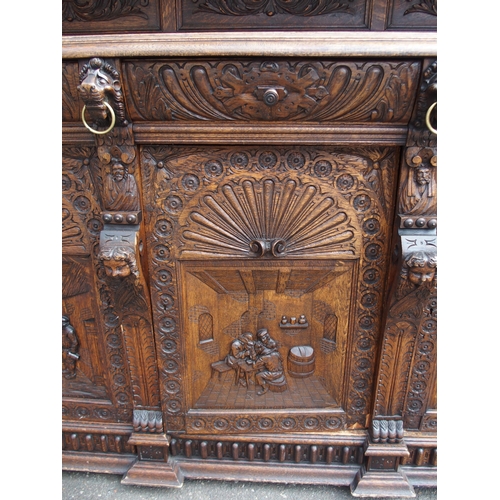 821 - A CONTINENTAL OAK DISPLAY SIDEBOARD