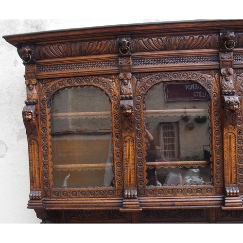 821 - A CONTINENTAL OAK DISPLAY SIDEBOARD