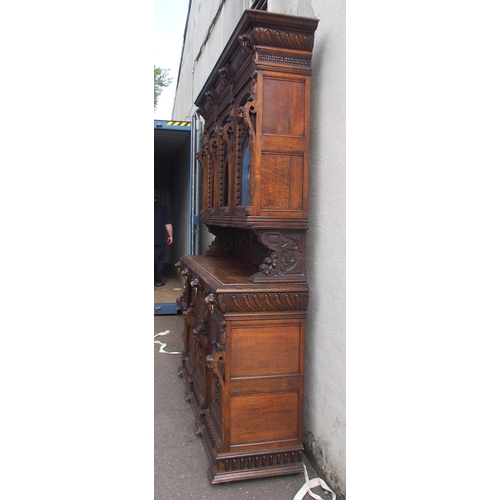 821 - A CONTINENTAL OAK DISPLAY SIDEBOARD