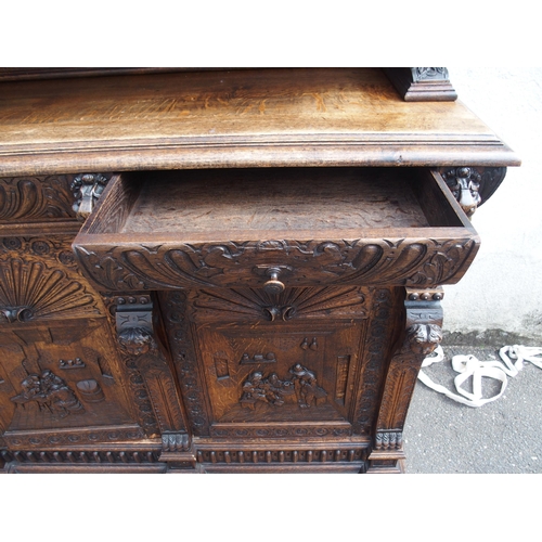 821 - A CONTINENTAL OAK DISPLAY SIDEBOARD