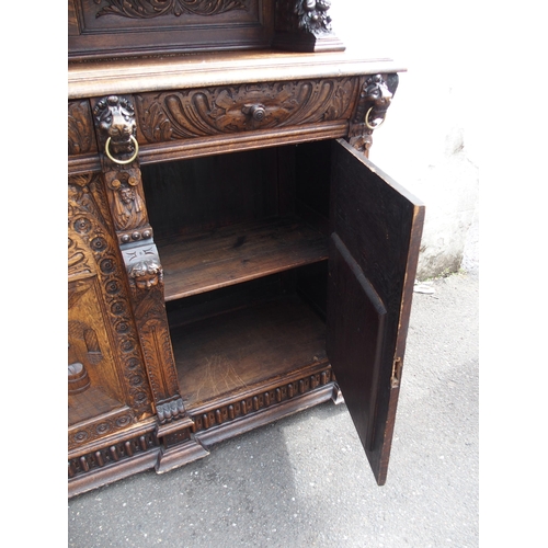 821 - A CONTINENTAL OAK DISPLAY SIDEBOARD