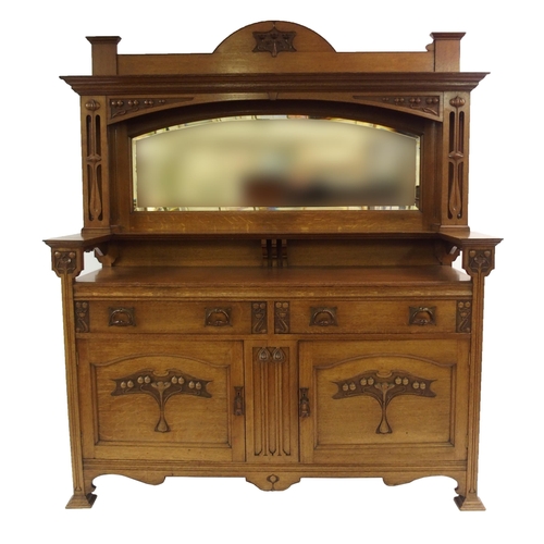 838 - AN ARTS AND CRAFTS OAK MIRROR BACK SIDEBOARD