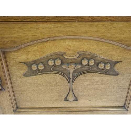 838 - AN ARTS AND CRAFTS OAK MIRROR BACK SIDEBOARD