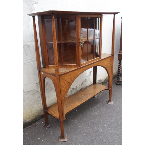 839 - AN ARTS AND CRAFTS OAK DISPLAY CABINET