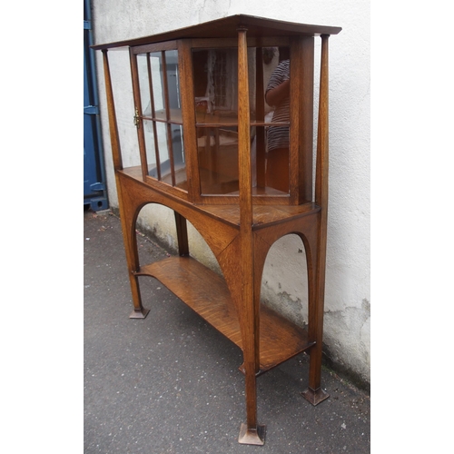 839 - AN ARTS AND CRAFTS OAK DISPLAY CABINET