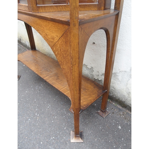 839 - AN ARTS AND CRAFTS OAK DISPLAY CABINET