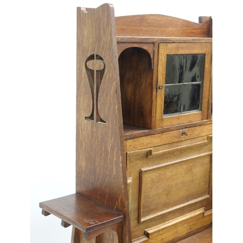 841 - AN ARTS AND CRAFTS OAK WRITING DESK