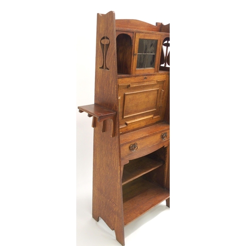 841 - AN ARTS AND CRAFTS OAK WRITING DESK