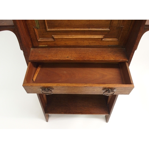 841 - AN ARTS AND CRAFTS OAK WRITING DESK