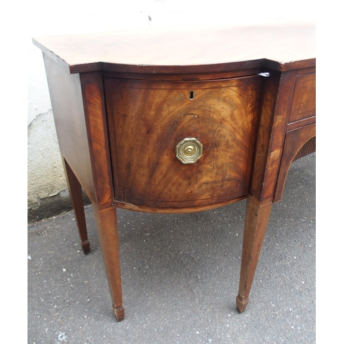 844 - A LATE GEORGIAN MAHOGANY BREAKFRONT SIDEBOARD