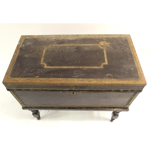 846 - A NAVAL LEATHER BOUND AND BRASS MOUNTED CAMPHORWOOD TRUNK