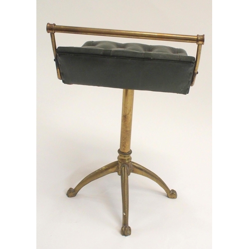 850 - A VICTORIAN BRASS AND LEATHER BUTTON SEAT PIANO STOOL