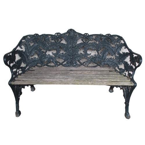 853 - A CAST IRON FERN PATTERN GARDEN BENCH