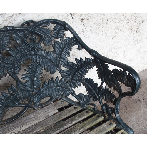 853 - A CAST IRON FERN PATTERN GARDEN BENCH