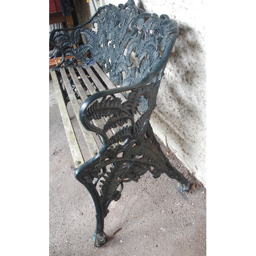 853 - A CAST IRON FERN PATTERN GARDEN BENCH