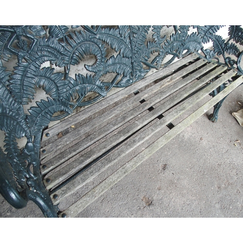 853 - A CAST IRON FERN PATTERN GARDEN BENCH