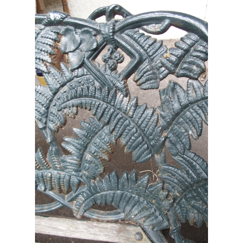 853 - A CAST IRON FERN PATTERN GARDEN BENCH