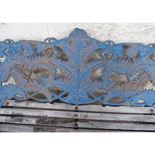 856 - A CAST IRON FERN PATTERN GARDEN BENCH