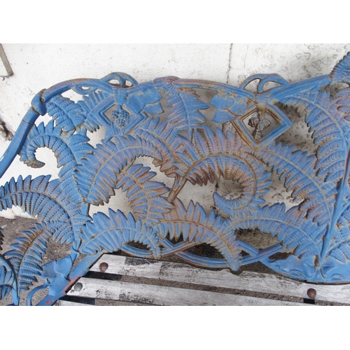 856 - A CAST IRON FERN PATTERN GARDEN BENCH