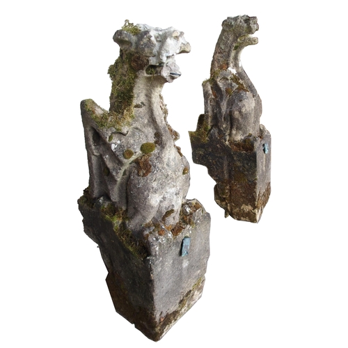 857 - A PAIR OF CARVED SANDSTONE RAIN WATER SPOUTS IN THE FORM OF GRIFFINS