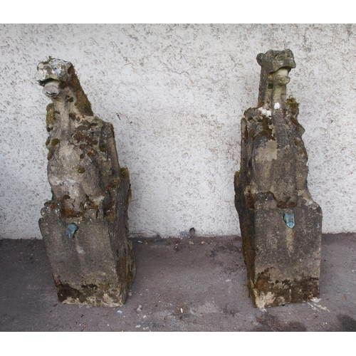 857 - A PAIR OF CARVED SANDSTONE RAIN WATER SPOUTS IN THE FORM OF GRIFFINS