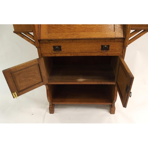 858 - AN ARTS AND CRAFTS OAK WRITING DESK