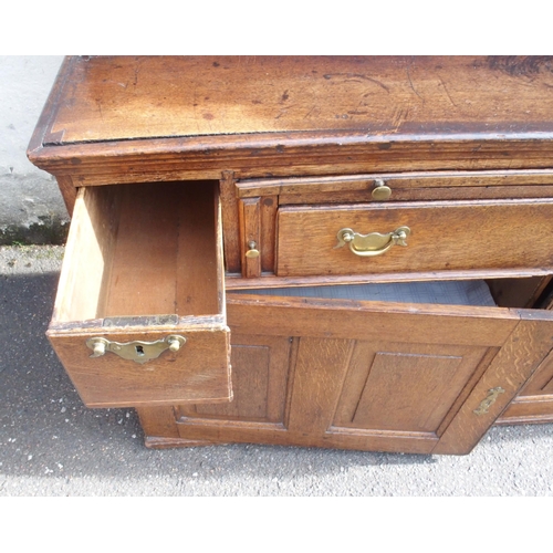 871 - A CONTINENTAL OAK DRESSER