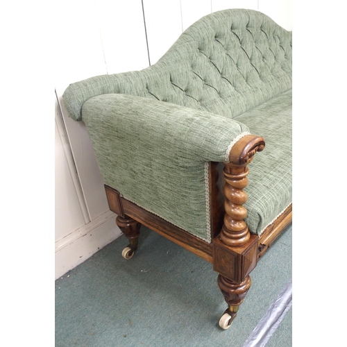 873 - A VICTORIAN ROSEWOOD SCROLL BACK SETTEE